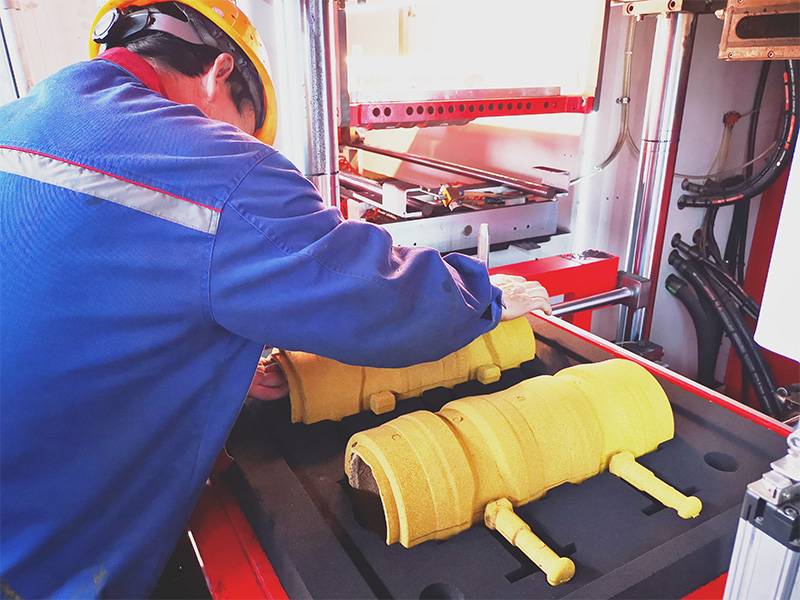 The foundry is operating the molding machine