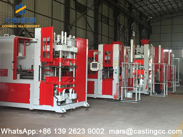 Top-under blowing sand molding machine